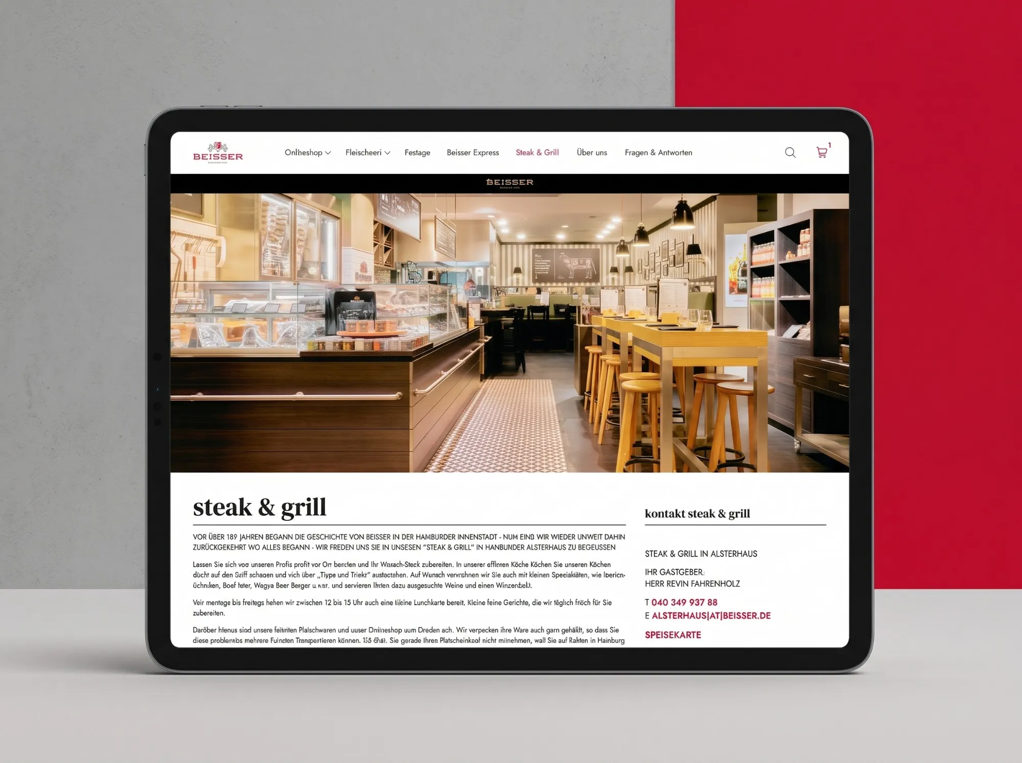 BEISSER-Website auf dem Tablet: Seite Steak & Grill im Alsterhaus mit Restaurantfoto und Kontaktdaten